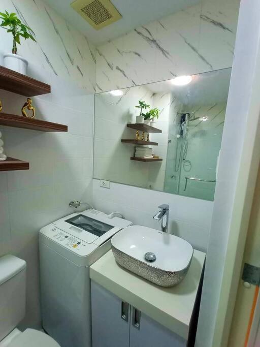 קואזון סיטי Cozy Studio Unit At Sun Residences מראה חיצוני תמונה