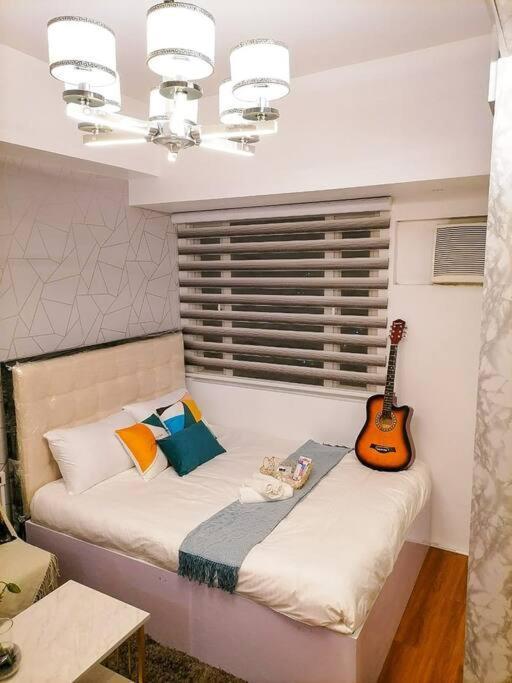 קואזון סיטי Cozy Studio Unit At Sun Residences מראה חיצוני תמונה