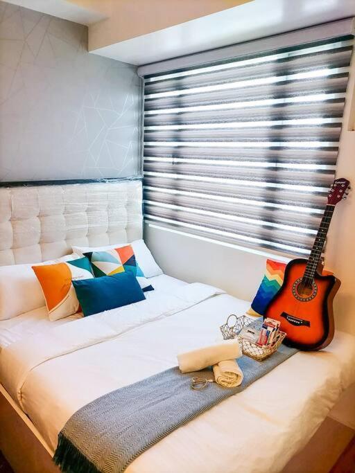 קואזון סיטי Cozy Studio Unit At Sun Residences מראה חיצוני תמונה